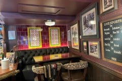 Burgundy field tiles with printed and tinted victorian design panels