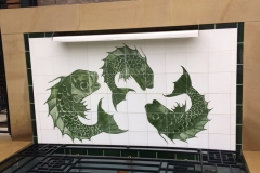 William De Morgan decorative panel installed behind water feature