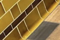 Golden brown curved skirting