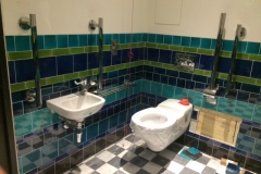 Bespoke bathroom using various tile sizes
