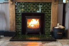 Dark olive fireplace surround tile