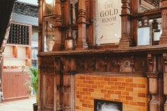 Mixed shades of golden brown fireplace tiles