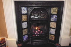 Decorative tile fireplace surround