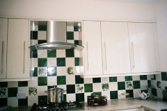 William De Morgan animals in green with olive and craquelle engobe plain tiles