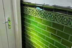 6"x2" mixed shades of olive tiles with tulip border, dado and skirting