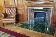 6"x2" olive hearth tiles set in a Herringbone pattern.