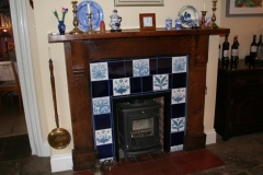 William Morris floral tiles with deep blue spacers