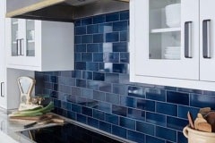 Mixed shades of marine kitchen backsplash