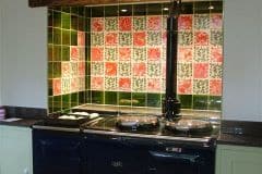 William De Morgan red animals with vertical leaf spacers and olive surround