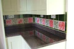 William De Morgan red animals with vertical leaf spacers and olive tiles