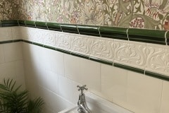 6"x6" tin white tiles with tulip border and olive dado and slip tile