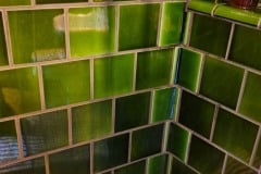 6"x6" tiles in mixed shades of olive
