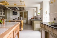 Tin white tiles with clipped corners to accept cast iron studs. Bespoke design and make by Artichoke Ltd. Photography: Emma Lewis