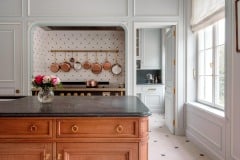 Tin white tiles with clipped corners to accept cast iron studs. Tiles set in diamond pattern. Bespoke design and make by Artichoke Ltd. Photography: Emma Lewis