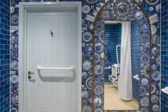Dark blue mid blue 6x3" tiles. Design and mosaics by Ann Schwegmann Fielding