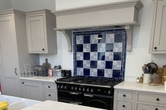 William Morris Longden tiles set with deep blue plain tiles
