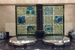 Aga panel using Wiiiam De Morgan decorative tiles and flying leaf spacers
