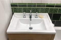 Olive 6"x6" tiles with tulip border and dado