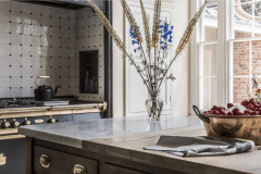 Tin white tiles with clipped corners and studs. Bespoke design and make by Artichoke Ltd. Photography by Emma Lewis