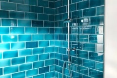 Shower using Amazonite 6"x3" field tiles