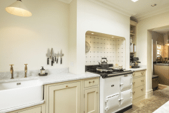 Tin white tiles with clipped corners to accept cast iron studs.