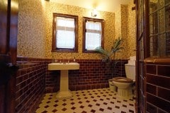 Teapot brown bathroom with skirting and dado