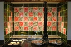William De Morgan red animals with vertical leaf spacers and olive surround