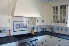 Bespoke kitchen splash back using decorative tiles
