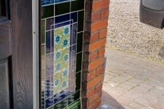 Porch 3 design including William De Morgan daisies, with tulip border, skirting and dado