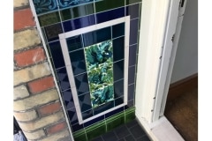 Porch tiles with William De Morgan fantastic animals panel
