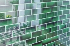 Mixed shades of Emerald entrance tiles 6"X3"