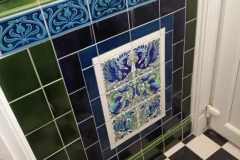 Entrance Porch with William De Morgan Fantastic creature tiles, skirting, tulip Border and dado