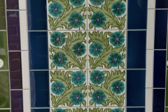 William De Morgan Turquoise daisies feature panel for porch. Tiled and photographed by Victorian tiled floors