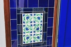 Deep blue with marine border with tubelined feature tiles (Porch 1)