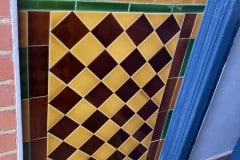 Bespoke porch tiles in teapot brown and honey